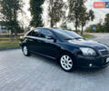 Черный Тойота Авенсис, объемом двигателя 1.8 л и пробегом 233 тыс. км за 6550 $, фото 2 на Automoto.ua