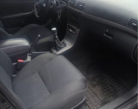 Черный Тойота Авенсис, объемом двигателя 2 л и пробегом 257 тыс. км за 5900 $, фото 4 на Automoto.ua