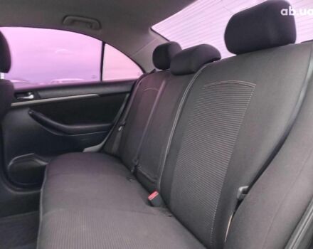 Черный Тойота Авенсис, объемом двигателя 1.8 л и пробегом 297 тыс. км за 7490 $, фото 17 на Automoto.ua