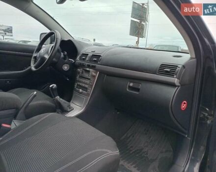Черный Тойота Авенсис, объемом двигателя 1.8 л и пробегом 297 тыс. км за 7490 $, фото 23 на Automoto.ua