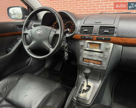 Черный Тойота Авенсис, объемом двигателя 1.79 л и пробегом 243 тыс. км за 7500 $, фото 26 на Automoto.ua