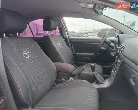 Черный Тойота Авенсис, объемом двигателя 1.8 л и пробегом 297 тыс. км за 7490 $, фото 22 на Automoto.ua