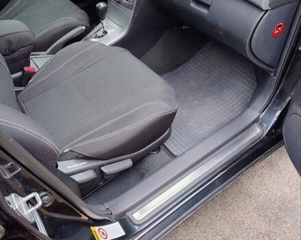 Черный Тойота Авенсис, объемом двигателя 1.8 л и пробегом 256 тыс. км за 7999 $, фото 12 на Automoto.ua