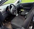 Черный Тойота Авенсис, объемом двигателя 2 л и пробегом 230 тыс. км за 7500 $, фото 9 на Automoto.ua