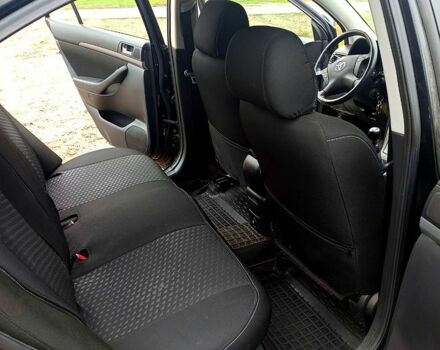 Черный Тойота Авенсис, объемом двигателя 2 л и пробегом 230 тыс. км за 7500 $, фото 12 на Automoto.ua