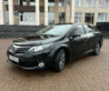 Чорний Тойота Авенсіс, об'ємом двигуна 2 л та пробігом 225 тис. км за 10650 $, фото 1 на Automoto.ua