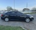 Черный Тойота Авенсис, объемом двигателя 2 л и пробегом 130 тыс. км за 10900 $, фото 1 на Automoto.ua
