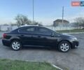 Черный Тойота Авенсис, объемом двигателя 2 л и пробегом 130 тыс. км за 10900 $, фото 4 на Automoto.ua