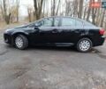 Черный Тойота Авенсис, объемом двигателя 2 л и пробегом 177 тыс. км за 11600 $, фото 4 на Automoto.ua