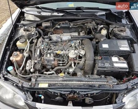 Черный Тойота Авенсис, объемом двигателя 2 л и пробегом 460 тыс. км за 3950 $, фото 10 на Automoto.ua