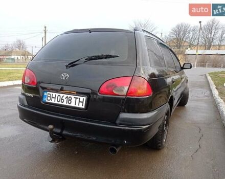 Черный Тойота Авенсис, объемом двигателя 2 л и пробегом 460 тыс. км за 3950 $, фото 1 на Automoto.ua