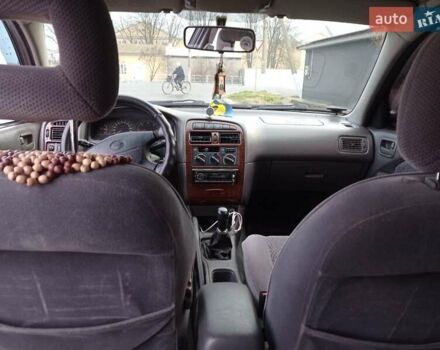 Черный Тойота Авенсис, объемом двигателя 2 л и пробегом 460 тыс. км за 3950 $, фото 7 на Automoto.ua