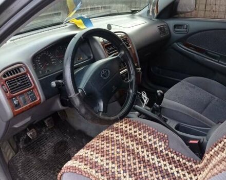 Черный Тойота Авенсис, объемом двигателя 2 л и пробегом 460 тыс. км за 3950 $, фото 9 на Automoto.ua