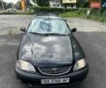 Черный Тойота Авенсис, объемом двигателя 1.6 л и пробегом 317 тыс. км за 3600 $, фото 3 на Automoto.ua