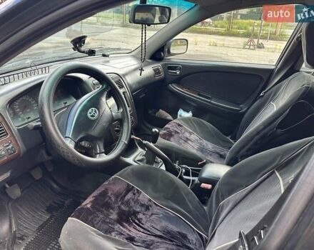 Черный Тойота Авенсис, объемом двигателя 1.6 л и пробегом 317 тыс. км за 3600 $, фото 15 на Automoto.ua