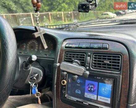 Черный Тойота Авенсис, объемом двигателя 1.6 л и пробегом 317 тыс. км за 3600 $, фото 9 на Automoto.ua