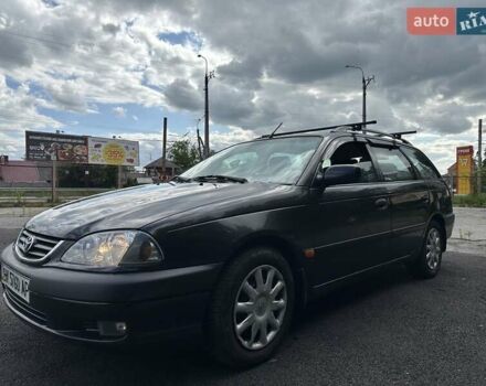 Черный Тойота Авенсис, объемом двигателя 1.6 л и пробегом 317 тыс. км за 3600 $, фото 2 на Automoto.ua