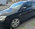 Чорний Тойота Авенсіс, об'ємом двигуна 2.4 л та пробігом 336 тис. км за 7999 $, фото 1 на Automoto.ua