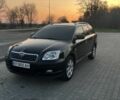 Черный Тойота Авенсис, объемом двигателя 2.4 л и пробегом 290 тыс. км за 6700 $, фото 1 на Automoto.ua