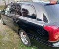 Черный Тойота Авенсис, объемом двигателя 2 л и пробегом 247 тыс. км за 5000 $, фото 1 на Automoto.ua