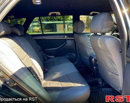 Чорний Тойота Авенсіс, об'ємом двигуна 2 л та пробігом 264 тис. км за 5400 $, фото 5 на Automoto.ua