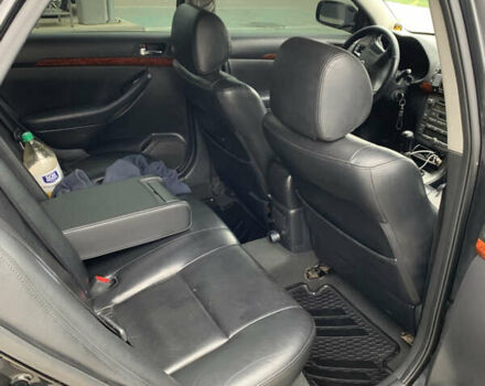 Черный Тойота Авенсис, объемом двигателя 2 л и пробегом 390 тыс. км за 5250 $, фото 4 на Automoto.ua