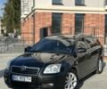 Черный Тойота Авенсис, объемом двигателя 2 л и пробегом 322 тыс. км за 4650 $, фото 1 на Automoto.ua