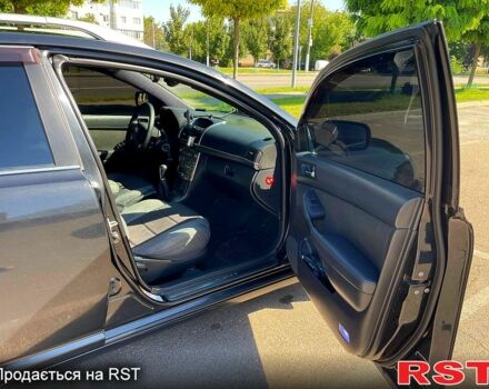 Чорний Тойота Авенсіс, об'ємом двигуна 2 л та пробігом 264 тис. км за 5400 $, фото 4 на Automoto.ua