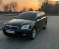Черный Тойота Авенсис, объемом двигателя 2.4 л и пробегом 290 тыс. км за 6700 $, фото 1 на Automoto.ua