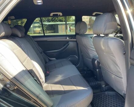 Черный Тойота Авенсис, объемом двигателя 2 л и пробегом 400 тыс. км за 5300 $, фото 7 на Automoto.ua