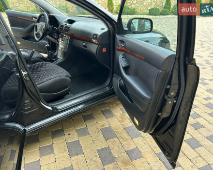 Черный Тойота Авенсис, объемом двигателя 2 л и пробегом 214 тыс. км за 5950 $, фото 69 на Automoto.ua