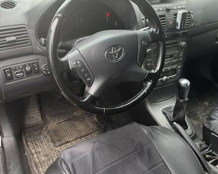 Черный Тойота Авенсис, объемом двигателя 2 л и пробегом 253 тыс. км за 5500 $, фото 7 на Automoto.ua