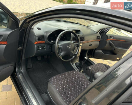 Черный Тойота Авенсис, объемом двигателя 2 л и пробегом 214 тыс. км за 5950 $, фото 29 на Automoto.ua