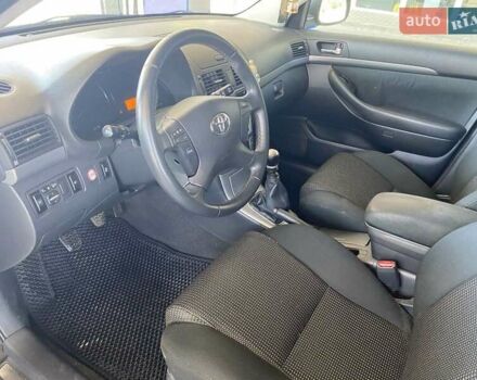 Черный Тойота Авенсис, объемом двигателя 2 л и пробегом 309 тыс. км за 7100 $, фото 14 на Automoto.ua