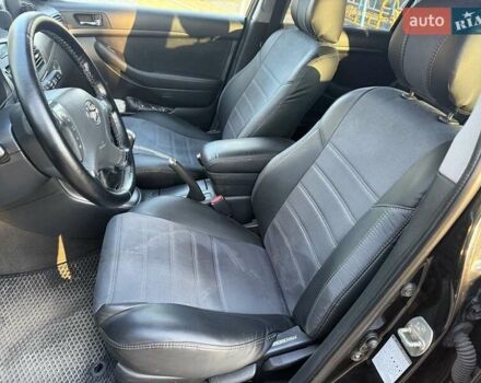 Черный Тойота Авенсис, объемом двигателя 2 л и пробегом 430 тыс. км за 6000 $, фото 5 на Automoto.ua