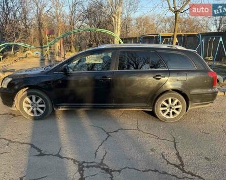 Черный Тойота Авенсис, объемом двигателя 2 л и пробегом 430 тыс. км за 6000 $, фото 1 на Automoto.ua