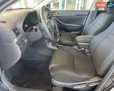 Черный Тойота Авенсис, объемом двигателя 2 л и пробегом 309 тыс. км за 7100 $, фото 13 на Automoto.ua