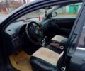 Черный Тойота Авенсис, объемом двигателя 2 л и пробегом 217 тыс. км за 6300 $, фото 1 на Automoto.ua