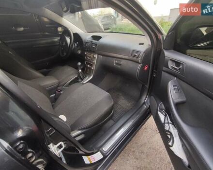 Черный Тойота Авенсис, объемом двигателя 2 л и пробегом 279 тыс. км за 6600 $, фото 15 на Automoto.ua