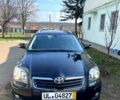 Черный Тойота Авенсис, объемом двигателя 18 л и пробегом 261 тыс. км за 7200 $, фото 1 на Automoto.ua