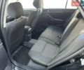 Черный Тойота Авенсис, объемом двигателя 1.79 л и пробегом 265 тыс. км за 6600 $, фото 2 на Automoto.ua