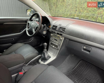 Чорний Тойота Авенсіс, об'ємом двигуна 2 л та пробігом 271 тис. км за 6599 $, фото 22 на Automoto.ua
