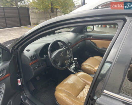 Черный Тойота Авенсис, объемом двигателя 2 л и пробегом 300 тыс. км за 6999 $, фото 19 на Automoto.ua