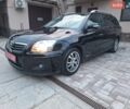Черный Тойота Авенсис, объемом двигателя 1.8 л и пробегом 185 тыс. км за 7500 $, фото 1 на Automoto.ua