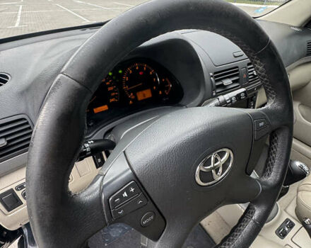 Черный Тойота Авенсис, объемом двигателя 2 л и пробегом 296 тыс. км за 5800 $, фото 10 на Automoto.ua