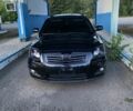 Черный Тойота Авенсис, объемом двигателя 2 л и пробегом 280 тыс. км за 8300 $, фото 1 на Automoto.ua