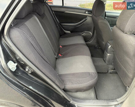 Черный Тойота Авенсис, объемом двигателя 1.8 л и пробегом 243 тыс. км за 7999 $, фото 51 на Automoto.ua