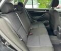 Чорний Тойота Авенсіс, об'ємом двигуна 1.8 л та пробігом 167 тис. км за 7700 $, фото 10 на Automoto.ua