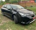 Черный Тойота Авенсис, объемом двигателя 2 л и пробегом 200 тыс. км за 9200 $, фото 1 на Automoto.ua