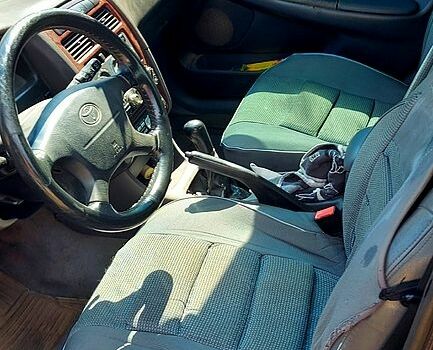 Черный Тойота Авенсис, объемом двигателя 1.8 л и пробегом 250 тыс. км за 2700 $, фото 3 на Automoto.ua